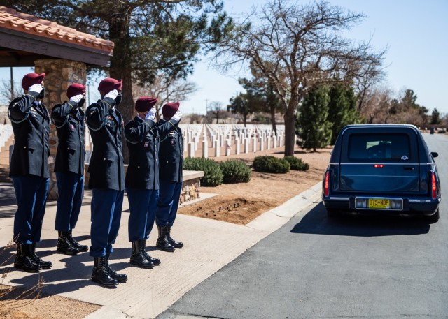 Paratroopers assigned to D Company, 2nd Battalion, 325th Airborne Infantry Regiment, 2nd Brigade Combat Team, 82nd Airborne Division salute during a funeral service for Pfc. Harvey Brown, a World War II veteran formerly assigned to 2nd Battalion,...