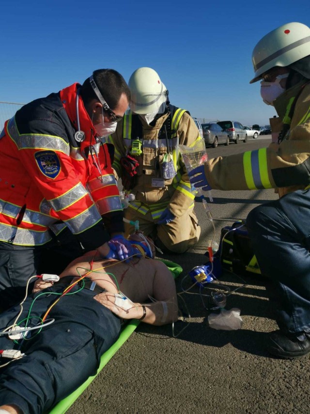 WIESBADEN, Germany – USAG Wiesbaden Firefighter Philipp Strobel (left) and two colleagues practice a medical emergency on a colleague. Other photos show different scenarios of the EMT-Intermediate training. The photos do not show real injuries....