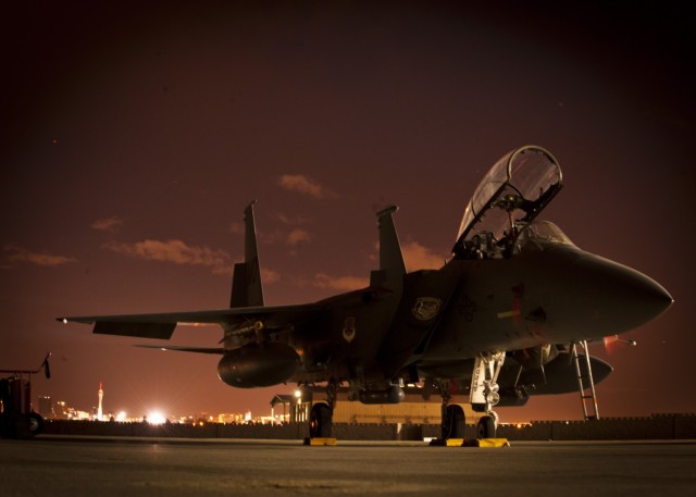 An F-15E Strike Eagle from the 391st Fighter Sqaudron, Mountain Home Air Force Base, Idaho., rests on the flightline before a night training mission during Red Flag 14-1 at Nellis Air Force Base, Nev., Jan. 30, 2014. The exercise is conducted on the 15,000-square-mile Nevada Test and Training Range, north of Las Vegas. (U.S. Air Force photo by Airman 1st Class Joshua Kleinholz)
