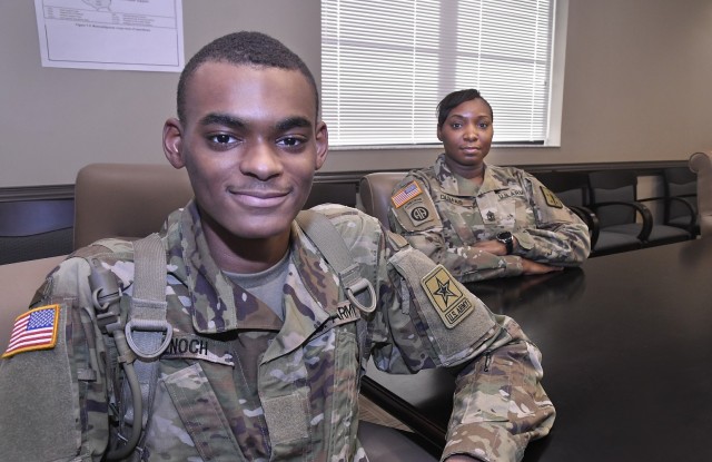 Pvt. Jason L. Enoch, an advanced individual training Soldier, and his mother, 1st Sgt. La'Tangie Dumas, pose for pictures Feb. 25 at the 244th Quartermaster Battalion. Dumas has been a 92A automated logistical specialist for 20 years, and her son...