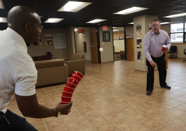 Walker along with Performance Center manager Scott Geise and performance expert Maegan Hoffman showcase one of the activities those who come to the R2 Center will participate in.
