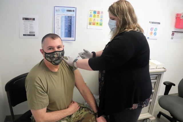 Garrison Commander Col. Michael Poss receives a second COVID-19 vaccination Feb. 26, 2021, at the Occupational Health Clinic at Fort McCoy, Wis. The clinic began providing COVID-19 shots in January 2021 and have continued the effort under a strict set of procedures that began with giving vaccinations to frontline and emergency services personnel. Poss was the first Soldier to receive the vaccine at the installation. (U.S. Army Photo by Scott T. Sturkol, Public Affairs Office, Fort McCoy, Wis.)