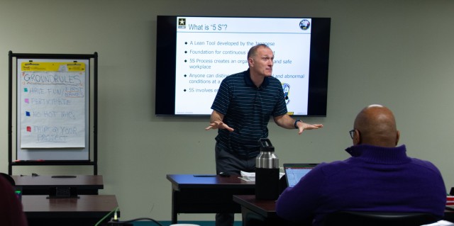 Garrison Deputy Commander Lt. Col. Alexander Carter teaches a Lean Six Sigma class March 2, 2021, at Fort McCoy, Wis. This training is part of a broader garrison initiative to develop its workforce by educating and training them with tools and...