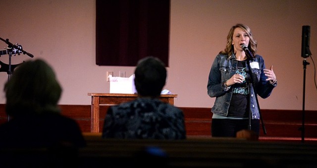 Tosha Lovell, Protestant Women of the Chapel vice president of programs, speaks to socially distanced PWOC members at the conclusion of their worship service March 9 at Frontier Chapel. Lovell spoke to the PWOC members via Zoom that morning for...