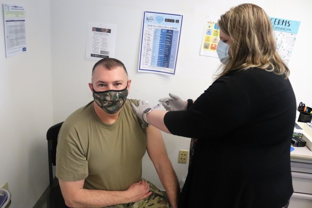 Garrison Commander Col. Michael Poss receives a second COVID-19 vaccination Feb. 26, 2021, at the Occupational Health Clinic at Fort McCoy, Wis. The clinic began providing COVID-19 shots in January 2021 and have continued the effort under a strict set of procedures that began with giving vaccinations to frontline and emergency services personnel. Poss was the first Soldier to receive the vaccine at the installation. (U.S. Army Photo by Scott T. Sturkol, Public Affairs Office, Fort McCoy, Wis.)