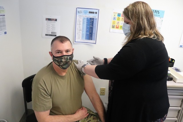 Garrison Commander Col. Michael Poss receives a second COVID-19 vaccination Feb. 26, 2021, at the Occupational Health Clinic at Fort McCoy, Wis. The clinic began providing COVID-19 shots in January 2021 and have continued the effort under a strict set of procedures that began with giving vaccinations to frontline and emergency services personnel. Poss was the first Soldier to receive the vaccine at the installation. (U.S. Army Photo by Scott T. Sturkol, Public Affairs Office, Fort McCoy, Wis.)