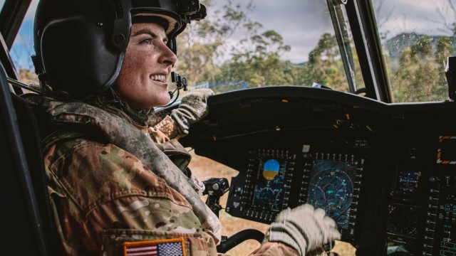 First Lt. Olivia Lopes, a pilot assigned to 3rd Battalion, 25th Aviation Regiment, 25th Combat Aviation Brigade, 25th Infantry Division, flies Soldiers in a CH-47 Chinook during training May 20, 2020, at Schofield Barracks, Hawaii.