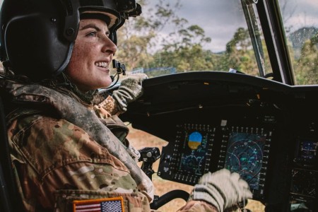 First Lt. Olivia Lopes, a pilot assigned to 3rd Battalion, 25th Aviation Regiment, 25th Combat Aviation Brigade, 25th Infantry Division, flies Soldiers in a CH-47 Chinook during training May 20, 2020, at Schofield Barracks, Hawaii. 