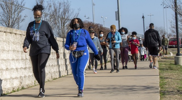 U.S. Army Soldier Sgt. 1st Class Jewel Lott (Left), a colon cancer survivor and awareness organizer assigned to the 120th Infantry Brigade, Division West walks with battle buddy Sgt. 1st Class Kimberly Lewis, assigned to Division West, during a colon cancer awareness walk on March 6 at Lions Club Park, Killeen, Texas.  While March is colon cancer awareness month, Lott has started a new journey of supporting her community by organizing an annual walk for colon cancer. 
(U.S. Army Reserve Photo by Staff Sgt. Erick Yates)