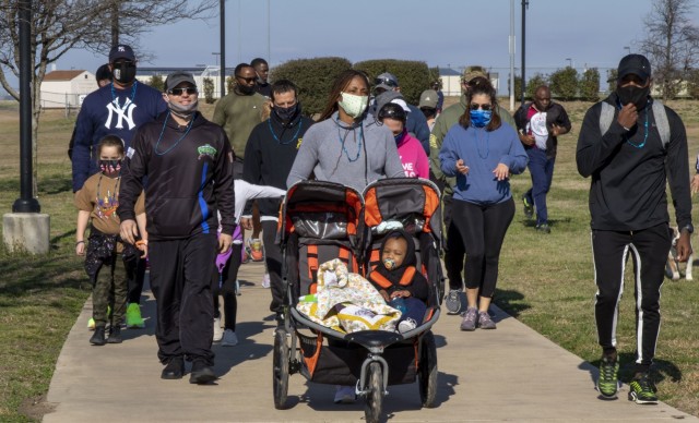 U.S. Army Soldiers from the 120th Infantry Brigade, Division West, along with friends and supporters participate in a second annual colon cancer walk hosted by 120th Soldier Sgt. 1st Class Jewel Lott, a colon cancer survivor, on March 6 at Lions Club Park, Killeen, Texas. While March is colon cancer awareness month, Lott has started a new journey of supporting her community by organizing an annual walk for colon cancer. (U.S. Army Reserve Photo by Staff Sgt. Erick Yates)