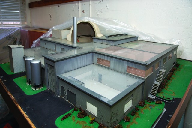 a scale model of the Fort Belvoir SM-1 nuclear power plant, sitting in under plastic in the reception area in this January photo.