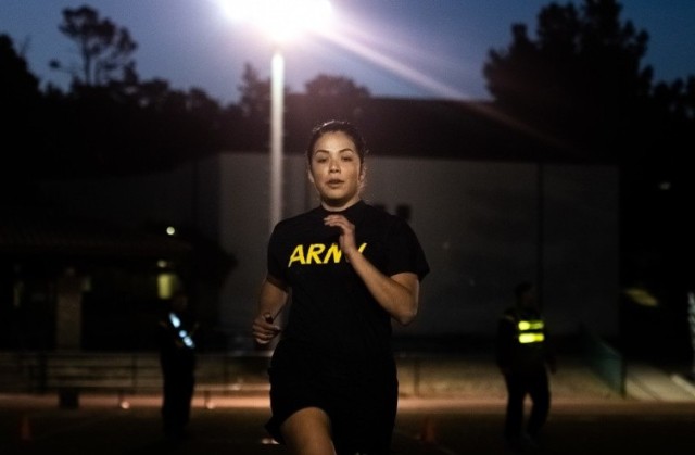 A 229th Military Intelligence Battalion Soldier races to the finish of the sprint-drag-carry portion of the Army Combat Fitness Test at the Presidio of Monterey, Calif., Nov. 1, 2019.