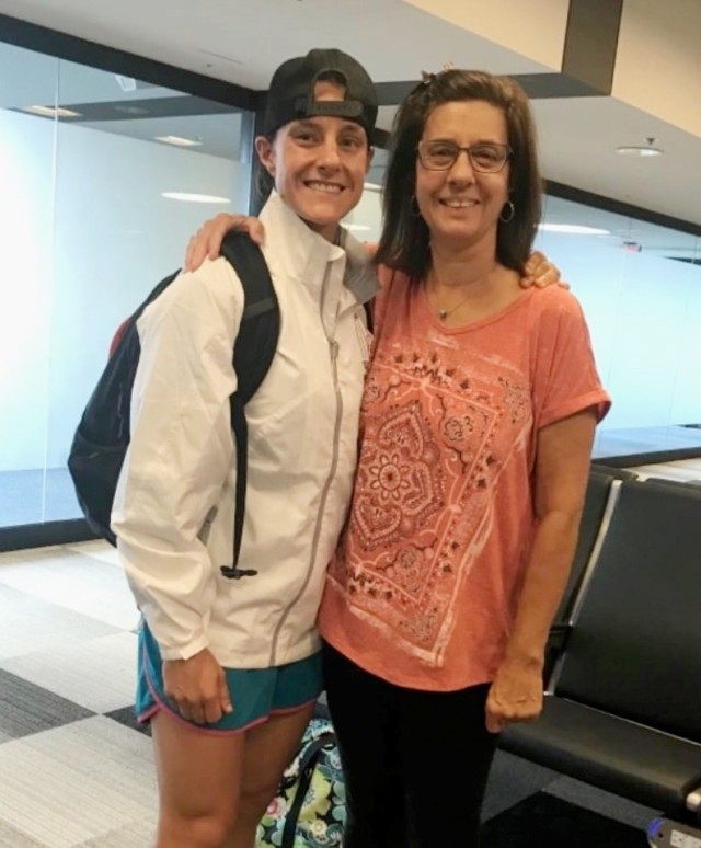 Maj. Allison Brager and her mother, Patrice Brager, share a moment just before they boarded a plane during Allison's journey to the Gay Olympics in Paris. Known to Allison as the "best parents in the world," Patrice and/or Allison's father, Larry,...