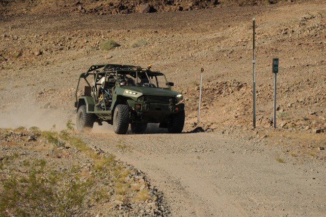 The Infantry Squad Vehicle currently under test at U.S. Army Yuma Proving Ground promises to give Soldiers an opportunity to arrive to a fight faster, rested, and ready. Powered by a 2.8 liter turbo diesel engine with a six speed automatic transmission, the four-wheel drive vehicle carries up to a nine Soldier infantry unit and their heavy gear.