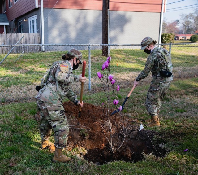 Planting a tree at Fort Benning. 