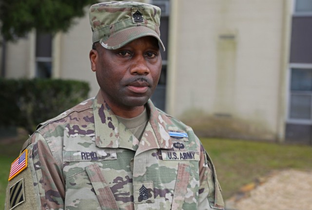 Command Sgt. Maj. Curtis Reid, the senior enlisted advisor for 1st Battalion, 28th Infantry Regiment, 3rd Infantry Division, poses for a photo March 3, 2021, at Fort Benning, Georgia. Reid, a Silver Star recipient, earned the award for rescuing...