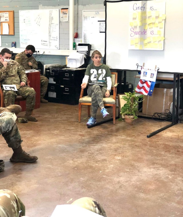 Laura Roman, U.S. Army Garrison Rheinland-Pfalz Army Substance Abuse Program Risk Reduction coordinator, talks with members of a unit about dealing with the grief they can expect after losing two fellow Soldiers to suicide in late 2020.