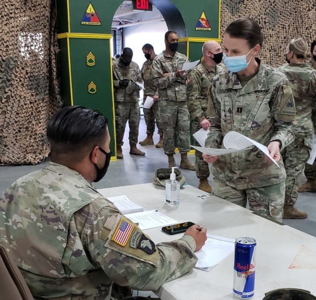 Soldiers assigned to Headquarters and Headquarters Battalion, 1st Armored Division complete a routine readiness inspection Feb. 22. Under OPERATION IRONCLAD, commanders at all levels must get to know their Soldiers and adhere to the fundamentals...