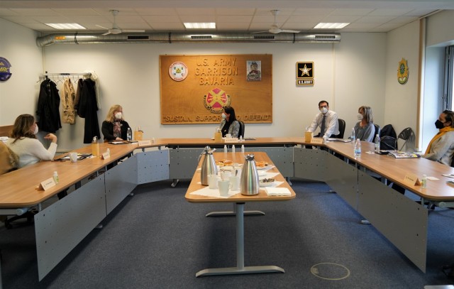 Tour participants hold a round table discussion with Family Advocacy Program and U.S. Army Medical Department Activity-Bavaria representatives, March 11, 2021. From left, Kristen Danbeck, Kathy Norrie, Angela Abernethy, Deputy Commander Howard...