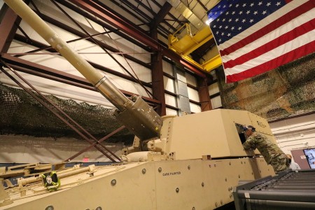 The autoloader for the Extended Range Canon Artillery is intended to speed up the rate of fire for greater lethality. In bottom right section of this photo, the Army Vice Chief of Staff, Gen. Joseph M. Martin, observes the second demonstration of the Extended Range Canon Artillery autoloader by observing the machinations through an ERCA opening. The demonstration was held at Picatinny Arsenal, N.J.