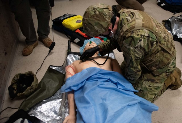 An Army paramedic tends to a simulated patient Jan. 11, 2021, during paramedic training at the Fort McCoy, Wis., Medical Simulation Training Center. The center is managed by the Directorate of Plans, Training, Mobilization and Security at Fort...