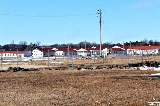 Construction fences are shown set up March 4, 2021, in the 1600 block of the cantonment area at Fort McCoy, Wis. The fences are in place as a construction project to build a second transient training troops barracks begins at the installation. The...