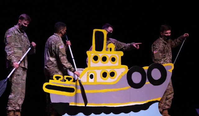 A scene from annual 100th Night Show, which has been a tradition since 1871, with this year's edition called, “100 70 Days until Graduation: The Commissioning Factory,” and was loosely based on “Charlie and the Chocolate Factory.” The show...