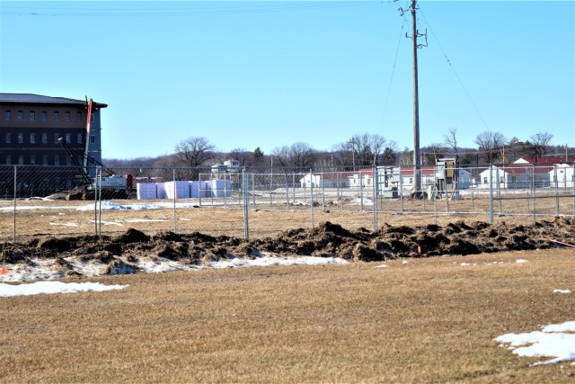 Construction fences are shown set up March 4, 2021, in the 1600 block of the cantonment area at Fort McCoy, Wis. The fences are in place as a construction project to build a second transient training troops barracks begins at the installation. The...