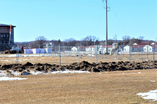 Construction fences are shown set up March 4, 2021, in the 1600 block of the cantonment area at Fort McCoy, Wis. The fences are in place as a construction project to build a second transient training troops barracks begins at the installation. The...