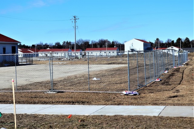 Construction fences are shown set up March 4, 2021, in the 1600 block of the cantonment area at Fort McCoy, Wis. The fences are in place as a construction project to build a second transient training troops barracks begins at the installation. The...