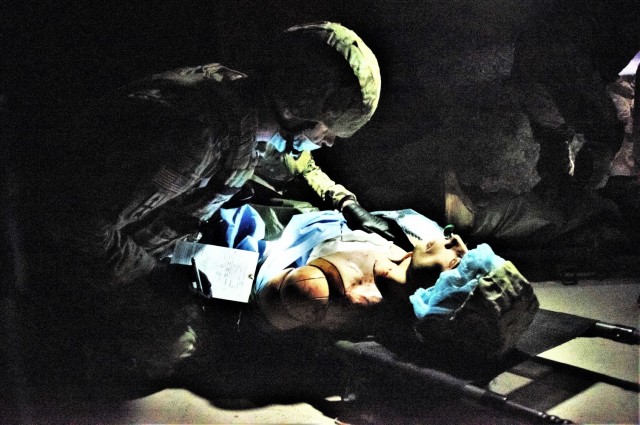An Army paramedic tends to a simulated patient Jan. 11, 2021, during paramedic training at the Fort McCoy, Wis., Medical Simulation Training Center. The center is managed by the Directorate of Plans, Training, Mobilization and Security at Fort...