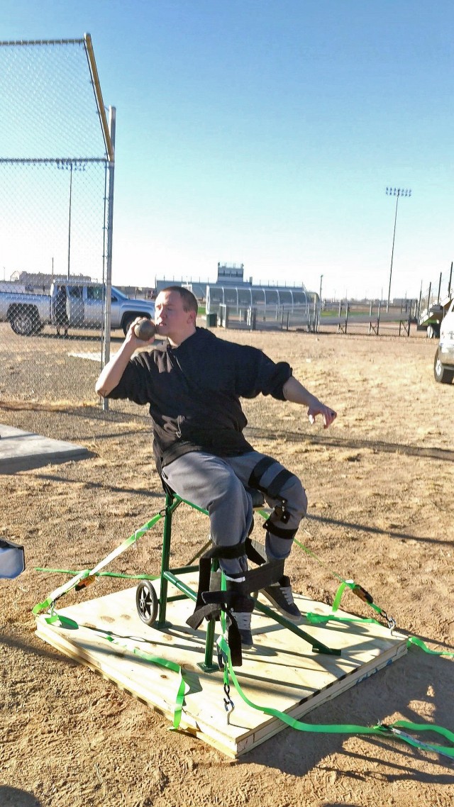 Sgt. James Brannen attempts the shotput while training February 25, 2021, at Fort Bliss in Texas. (Photo via Alan Cooksey)