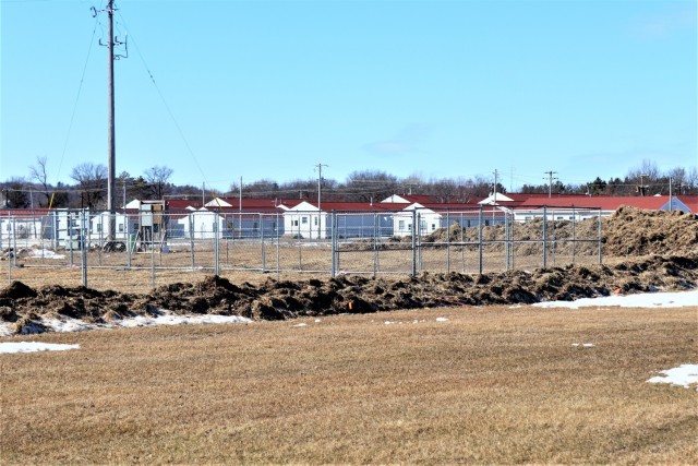 Construction fences are shown set up March 4, 2021, in the 1600 block of the cantonment area at Fort McCoy, Wis. The fences are in place as a construction project to build a second transient training troops barracks begins at the installation. The...