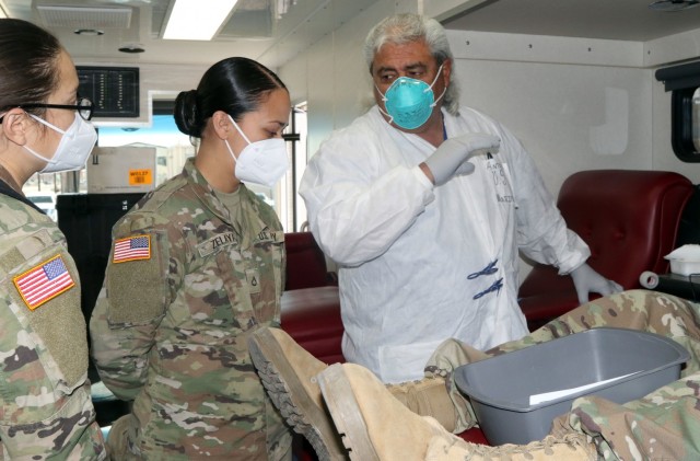 Mr. Antonio Siba, a laboratory technician with the Armed Services Blood Program explains blood donation procedures to Soldiers in the advanced individual training phase (AIT) during a blood drive on Fort Bliss, Texas, May 16, 2021. The event provided an experienced training environment for service members training to become laboratory technicians in the AIT phase on Fort Bliss. Blood drives are important because they provide quality blood products for service members, veterans and their families in both peace and war. For 5th AR BDE, preparing Soldiers to go into harm’s way isn’t merely a cold, mechanical process; rather, it’s a dedication to individuals’ strengths and needs, focused on achieving the mission. (U.S. Army photo by Staff Sgt. John Onuoha, 5th Armored Brigade)