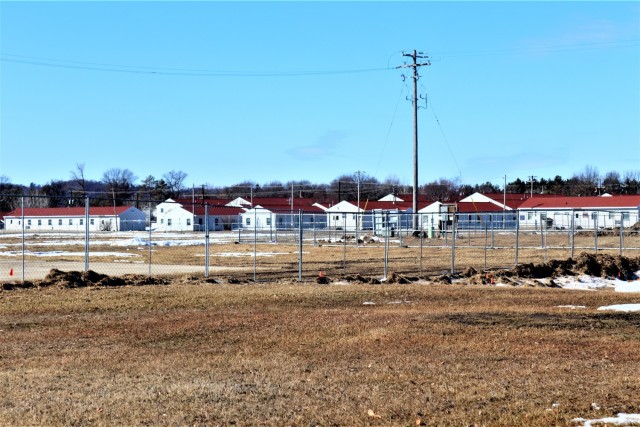 Construction fences are shown set up March 4, 2021, in the 1600 block of the cantonment area at Fort McCoy, Wis. The fences are in place as a construction project to build a second transient training troops barracks begins at the installation. The...