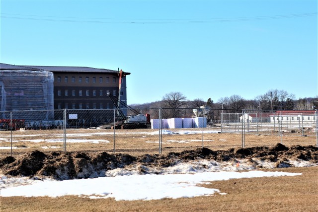 Construction fences are shown set up March 4, 2021, in the 1600 block of the cantonment area at Fort McCoy, Wis. The fences are in place as a construction project to build a second transient training troops barracks begins at the installation. The...