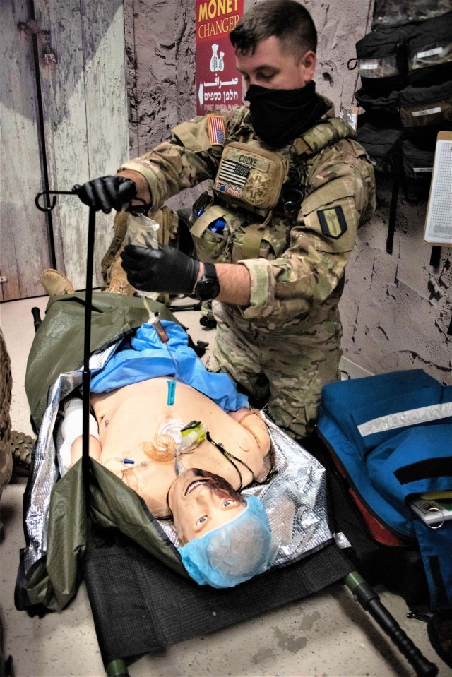 An Army paramedic tends to a simulated patient Jan. 11, 2021, during paramedic training at the Fort McCoy, Wis., Medical Simulation Training Center. The center is managed by the Directorate of Plans, Training, Mobilization and Security at Fort...