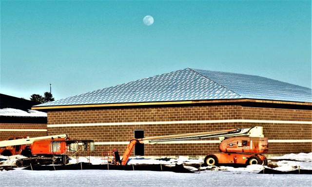 Work on a new simulations building is shown Feb. 25, 2021, in the 200 block of the cantonment area at Fort McCoy, Wis. The construction of this facility is by Contractor MDM Construction Supply of Rockford, Ill. This is the same contractor that has nearly completed five other buildings that began construction in 2019. Once all six new buildings are completed, the simulations training capabilities at Fort McCoy will be more centralized and offer more capability. The simulations training complex is managed by the Fort McCoy Directorate of Plans, Training, Mobilization and Security. The construction project is coordinated by the Fort McCoy Directorate of Public Works. (US. Army Photo by Scott T. Sturkol, Public Affairs Office, Fort McCoy, Wis.)