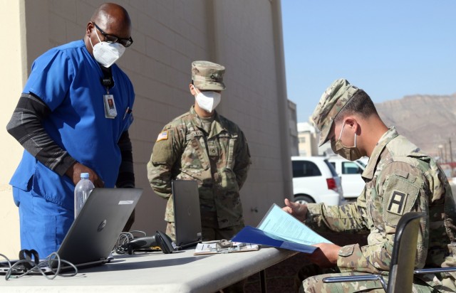 A laboratory technician with the Armed Services Blood Program observes a donor assigned to 5th Armored Brigade, First Army Division West, during a blood drive on Fort Bliss, Texas, May 16, 2021. Blood drives are important because they provide quality blood products for service members, veterans and their families in both peace and war. For 5th AR BDE, preparing Soldiers to go into harm’s way isn’t merely a cold, mechanical process; rather, it’s a dedication to individuals’ strengths and needs, focused on achieving the mission. (U.S. Army photo by Staff Sgt. John Onuoha, 5th Armored Brigade)