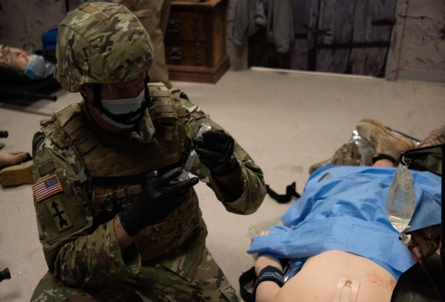 An Army paramedic tends to a simulated patient Jan. 11, 2021, during paramedic training at the Fort McCoy, Wis., Medical Simulation Training Center. The center is managed by the Directorate of Plans, Training, Mobilization and Security at Fort...