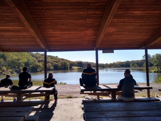 Soldiers and a cadre member from the Fort Riley Soldier Recovery Unit, Kan., participated in guided meditation on the shore of Moon Lake in September 2020. (Photo courtesy of Rebecca Weston)