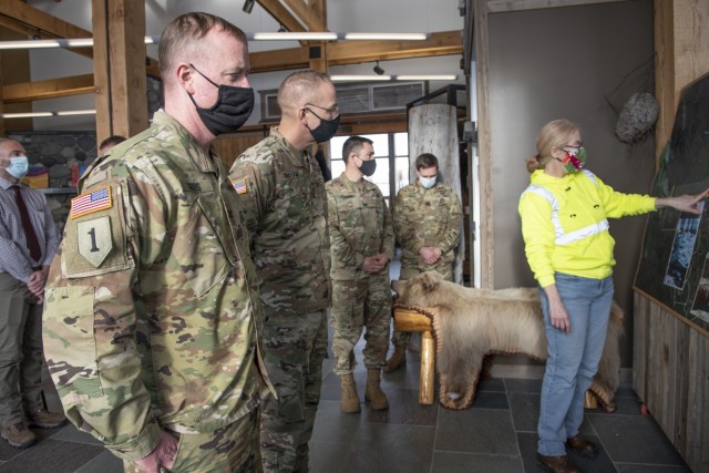 Julie Anderson, chief of the Operations Branch for U.S. Army Corps of Engineers – Alaska District, briefs Maj. Gen. William Graham (second from left), deputy commanding general for USACE Civil and Emergency Operations; Col. Kirk Gibbs, USACE...