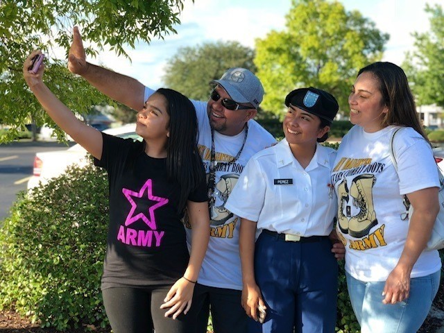 Army Spc. Keylin Jasmin Perez poses with her family after graduating basic training in 2018. Perez is a supply specialist with the 200th Military Police Command as well as a nursing student and cheerleader at Coppin State University in Baltimore,...