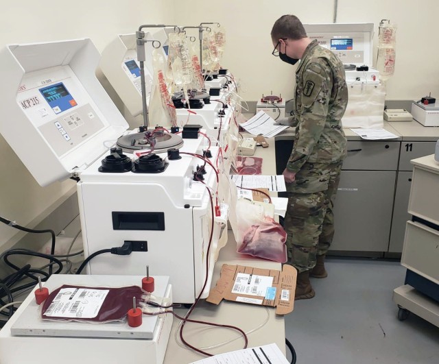 Spc. Raymond Torrissi, with the 95th Medical Detachment-Blood Support, reviews quality assurance documents required for the blood deglycerolization process at Camp Humphreys, South Korea.
