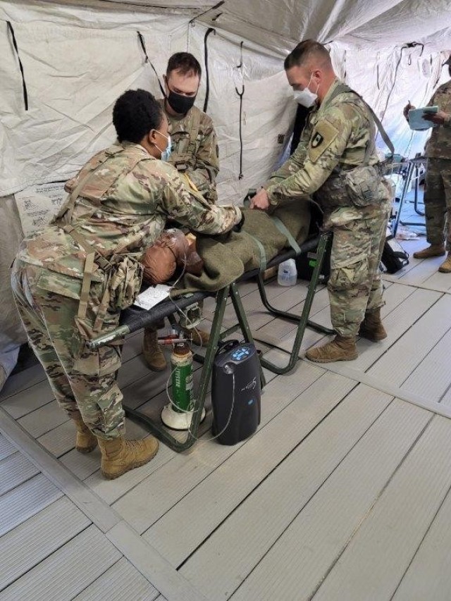 Soldiers with the 36th Medical Care Area Support, 44th Medical Brigade at Fort Bragg, perform realistic medical scenarios during a Field Oxygen Generator Resource test. (Photo by USAMEDDBD)