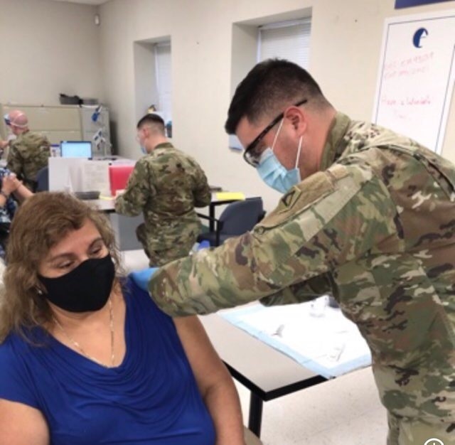 Combat medic’s most tense moment – vaccinating his mom