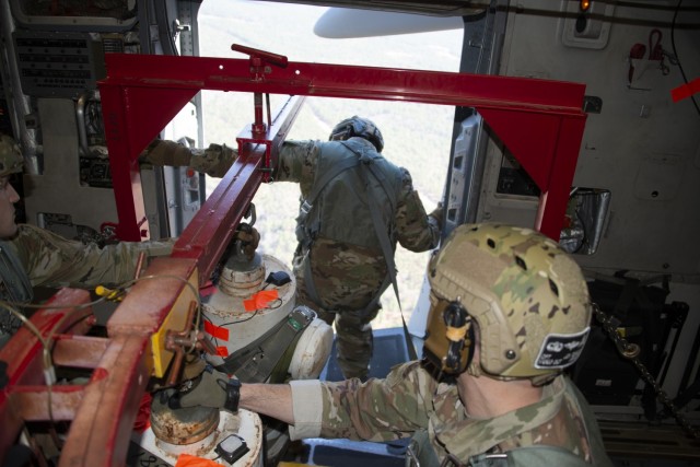 Ft. Bragg Army test paratroopers check leading edge possible T-11 parachute replacements
