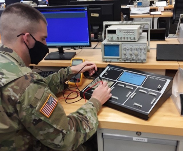 Pvt. Garrett Chance measures resistance using new BEMT-II console as part of his training to be a 94H Test, Measurement and Diagnostic Equipment Maintenance Support Specialist at the U.S. Army Ordnance School, Fort Lee, Virginia.