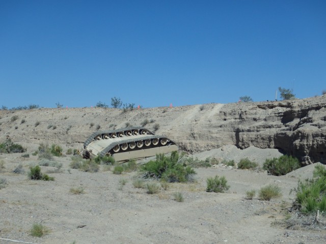 During a field training exercise, an Armor platoon’s mission was to conduct a tactical movement along a designated route to establish defensive positions. While maneuvering during limited visibility on a 10-percent incline at approximately 7-10...