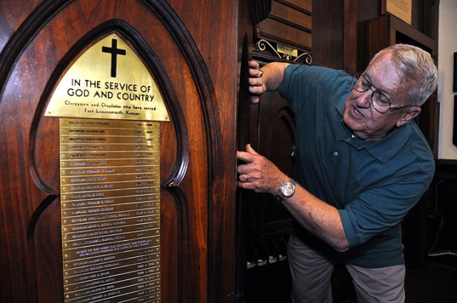 Retired Lt. Col. Dick Wright talks about the chaplains who have served in Memorial Chapel after affixing the name of departing Chaplain (Maj.) Sean Wead May 28, 2015, at Memorial Chapel. Wright was recognized as one of post’s outstanding...